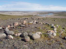 Tent ring and Arctic Ocean on diamond exploration property in Nunavut